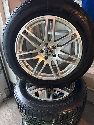 No time like the present! For sale are 4 perfect BF Goodrich P235/60r/18 103T Winter T/A KSI tires....