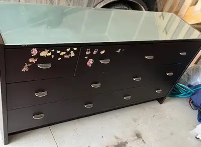 Dresser in excellent condition, with glass top and 7 drawers, View more