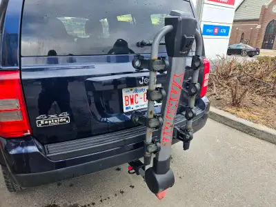 Yakima 4-bike rack - $150.00 Jeep Patriot 2007–2017 Cross Bars - $100.00