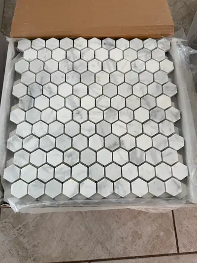 1” marble mosaic on mesh. 17 sheets available. New - unused $10 sq ft. Would sell all for $150 Pick...