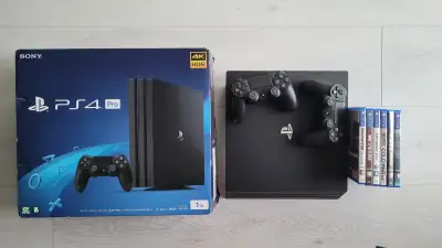 PS4 Pro 1TB + 2 Controllers + 6 Games, View more