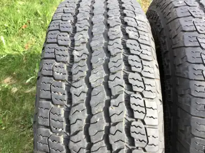 Selling three only,Goodyear Wrangler Territory AT truck tires reinforced with Kevlar.Size 265-70-16.