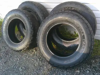 This is a set decent set of 10 ply Motomaster Total Terrain All terrain tires that have a decent amo...