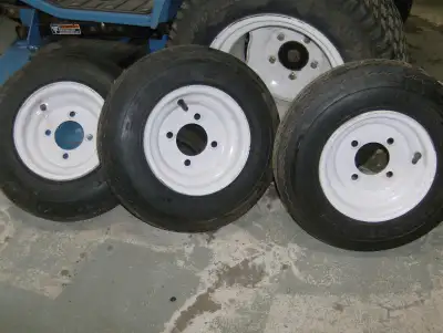 3 - 4.80-8 4 bolt pattern rims and tires , new condition , asking $60 for all 3. 226-930-9524