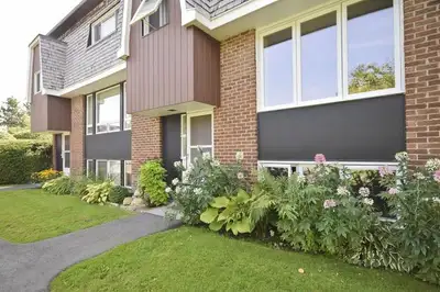 LARGE, BRIGHT, FURNISHED ROOM available May 1st, in a meticulously maintained three-bedroom townhome...
