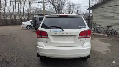 Reliable 2011 Dodge Journey Crew with a 3.6 L engine and FWD. This white SUV has 205,000 kms and inc...