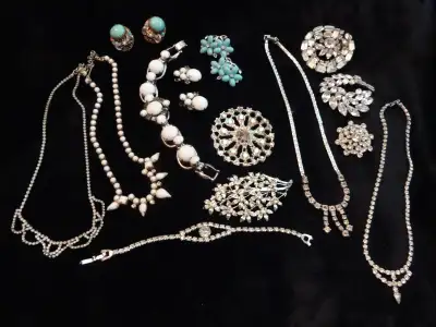 I've combined a number of necklaces .. bracelets.. earrings and brooches - Clear Rhinestones plus If...