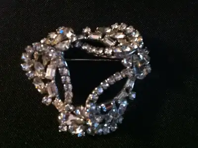 a beautiful rare vintage crystal brooch by sherman. this piece is in perfect condition and you can e...