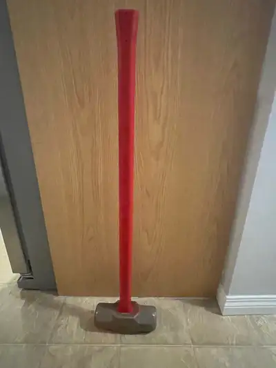 This is a used 16 lbs sledgehammer, perfect for demolition work, breaking up concrete, or any heavy-...