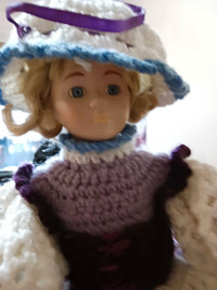 Vintage porcelain doll w/ hand crafted crochet dress