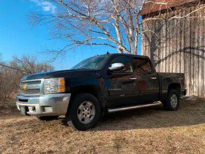 Levelling kit, new front brakes and calipers only 6 months old. New CV axle only 2 weeks old. Truck...