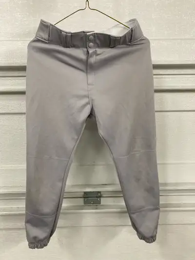 Gently used Youth XL baseball pants, elasticized cuffs, comes with your colour choice of belt, Locat...