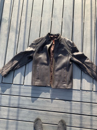 Men’s small to med (38) motorcycle leather jacket  good conditio