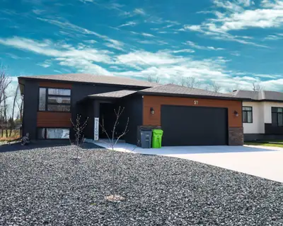 Welcome to your future dream home on 2 acres in the beautiful new Ivy Ridge Development! This high-q...