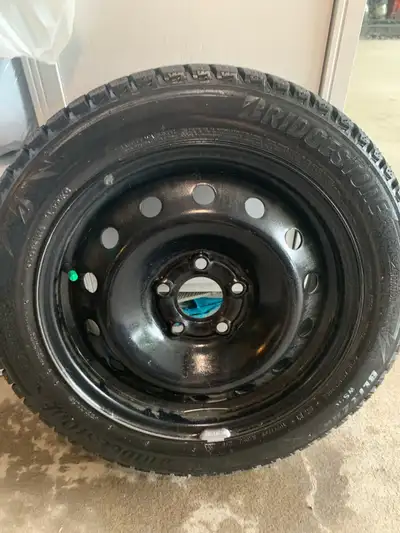Like new blizzak Bridgestone snow tires and rims 195/55/16 Like new only 5000km Off 2016 Mini Cooper...