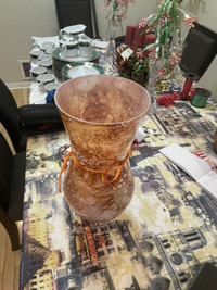 Glass decorative vase with narrow neck 