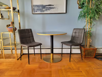 Three piece contemporary dining set consisting of two tufted grey leatherette dining chairs and one...