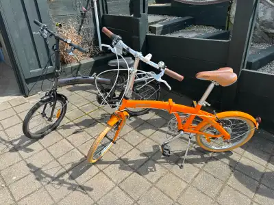 Have 2 Citizen "Miami" 20" quick fold bicycles - great for RV or about town. One black, one orange....