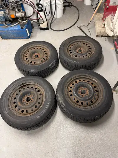 Set of 4 Michelin CrossClimate® 2 all-weather tires Size: 235/65R17 104H Mounted on steel rims Very...