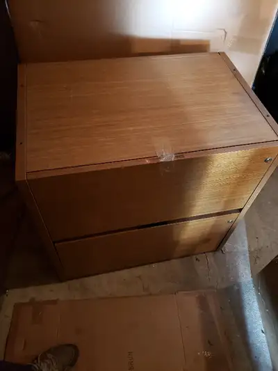 2 drawer wood cabinet for files or storage , good condition. Have 3 of these, 60 each, black cabinet...