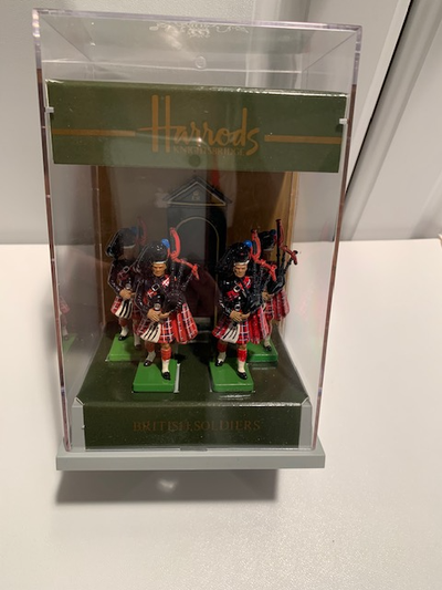 Harrods / W. Britain Metal Toy Soldiers in Display Case. Four Scottish Bag Pipers, I believe. In ori...