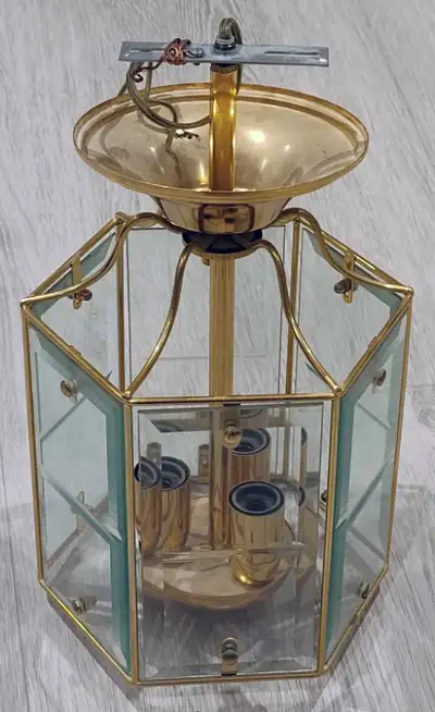 Beveled glass, hexagon shaped gold chandeliers, View more