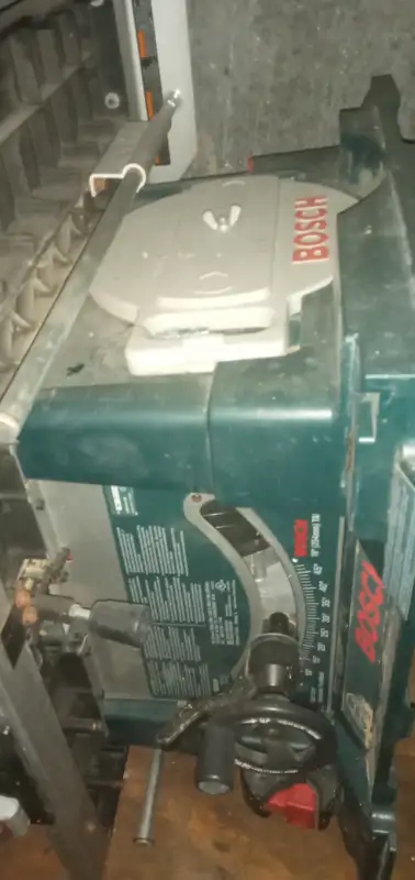 BOSCH 10" portable table saw (light use) with new folding stand