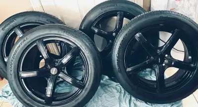4 x All season Tires and Wheels Package * Continental PureContact LS EcoPlus 94V all-season tires on...