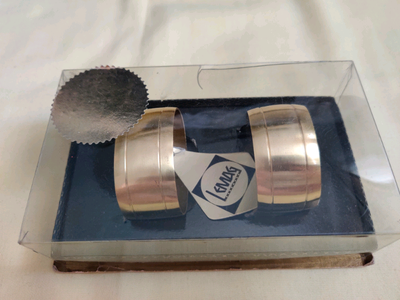 Brand new gold-coloured napkin holders, View more