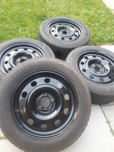Set of good year ultra grip winter tires on steel rims with tpms mounted and balanced with lots of t...