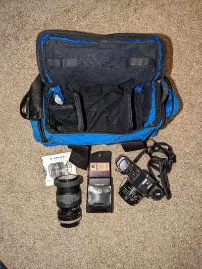 Canon T50 35mm Film Camera Bundle, View more