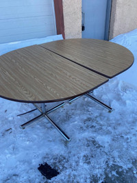 Folding Dining Table, 4.5 ' by 6'. Metal frame. $185