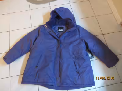 Active Zone Purple winter coat with nice fur on the inside to keep you very warm. BRAND NEW with tag...