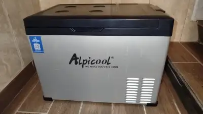 Alpicool C40 liter camping fridge. Good working condition. Comes with car adapter and 110v adapter....