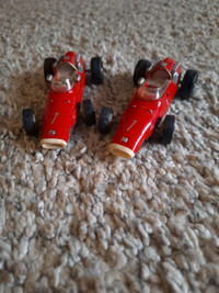 2 red Ferrari micro racers made in Germany
