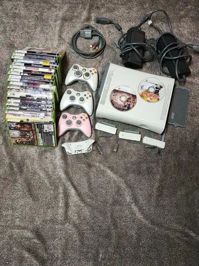 XBOX 360 combo. Comes with 3 controllers (all tested at the time of posting) and a controller keyboa...