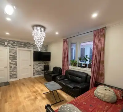 Welcome to this spacious 2-bedroom main floor apartment, ideally located just a 2-minute walk from D...