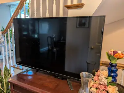 This is a non-functional 50-inch LED TV, perfect for real estate agents, home stagers, or photograph...