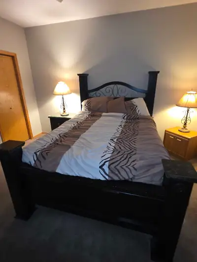 Brand new bedroom set includes Queen mattress/box spring and frame, dresser with mirror and 2 side t...