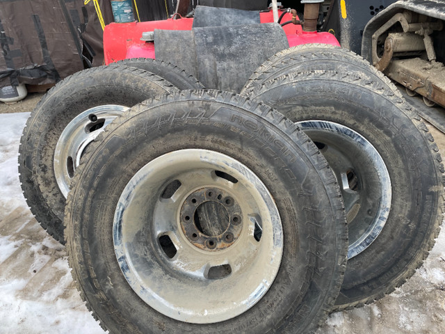 Dodge dually, studded Nokian winter tires with Steel rims. in Tires & Rims in Whitehorse