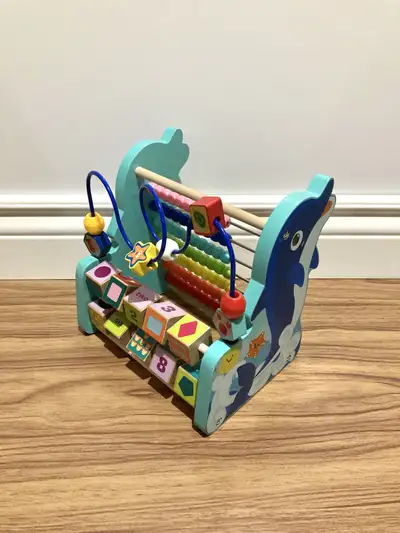 Multi activity wooden toddler toy, View more