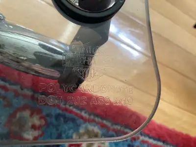 Windshields for Harley Davison motor cycles, part number is, DOT 202 AS6 M19, very good condition, s...
