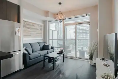 Live In Toronto's Sought-After Lakeshore Community! Steps From The Boardwalk And Lake Views! This Su...