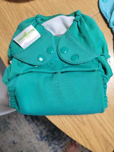 AMAZING bum genius double lined *select a size* cloth diapers. 24 in total. Enough to keep your baby...