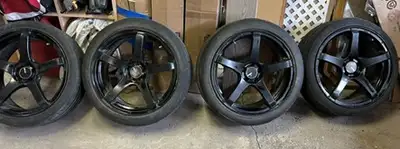 18" summer rims and tires 5x100 previously installed on 2013 subaru imprezza comes with spare tire 2...