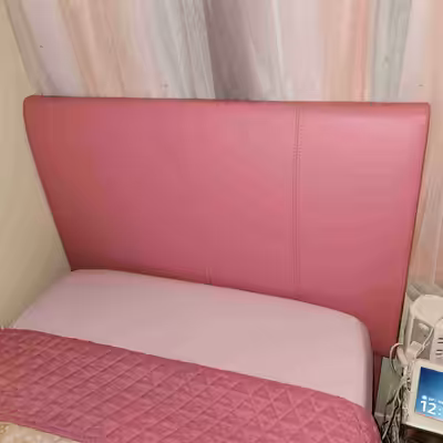 Pink padded vinyl twin headboard. Pick up in St. Thomas.