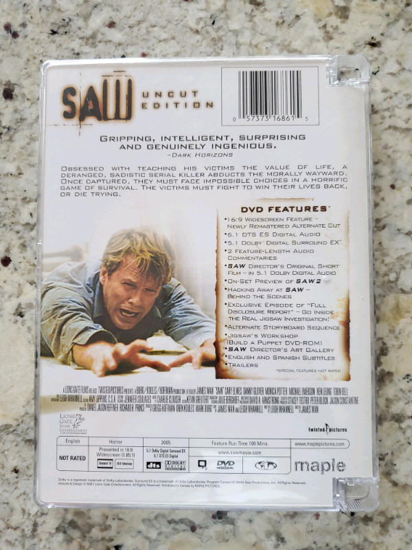 Saw Uncut Edition Widescreen DVD - Razor Case in CDs, DVDs & Blu-ray in Mississauga / Peel Region - Image 2