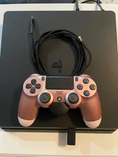 Open to reasonable offers, comes with: 1TB PS4 slim console 1 controller 6ft charging cord 1 back bu...