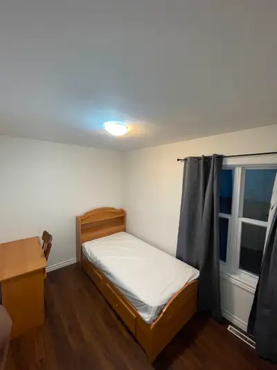 Room for rent detached house rented by females.