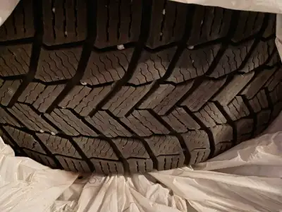 4 Winter tires on steel rims - balanced 205 / 55 / R16 Michelin X-ice As-is Text/call - 613-803-1960